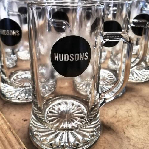 Custom branded beer mug with Hudson's logo